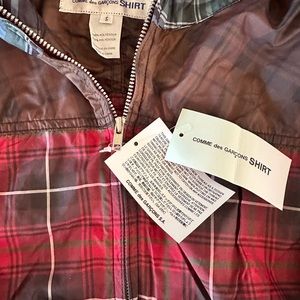 Comme Des Garcons Rain Hoodie. Unisex